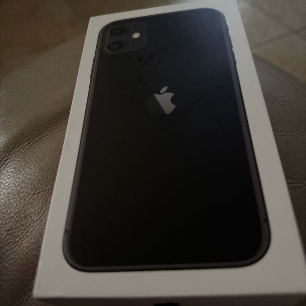 i Phone 11 box only with USB-C to lightning cable.  Does not include phone.